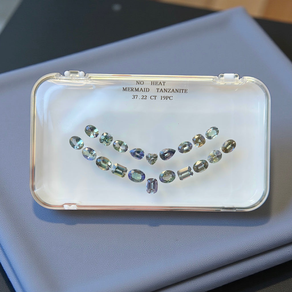 37.22 CT NATURAL NO HEAT MERMAID TANZANITE SET
