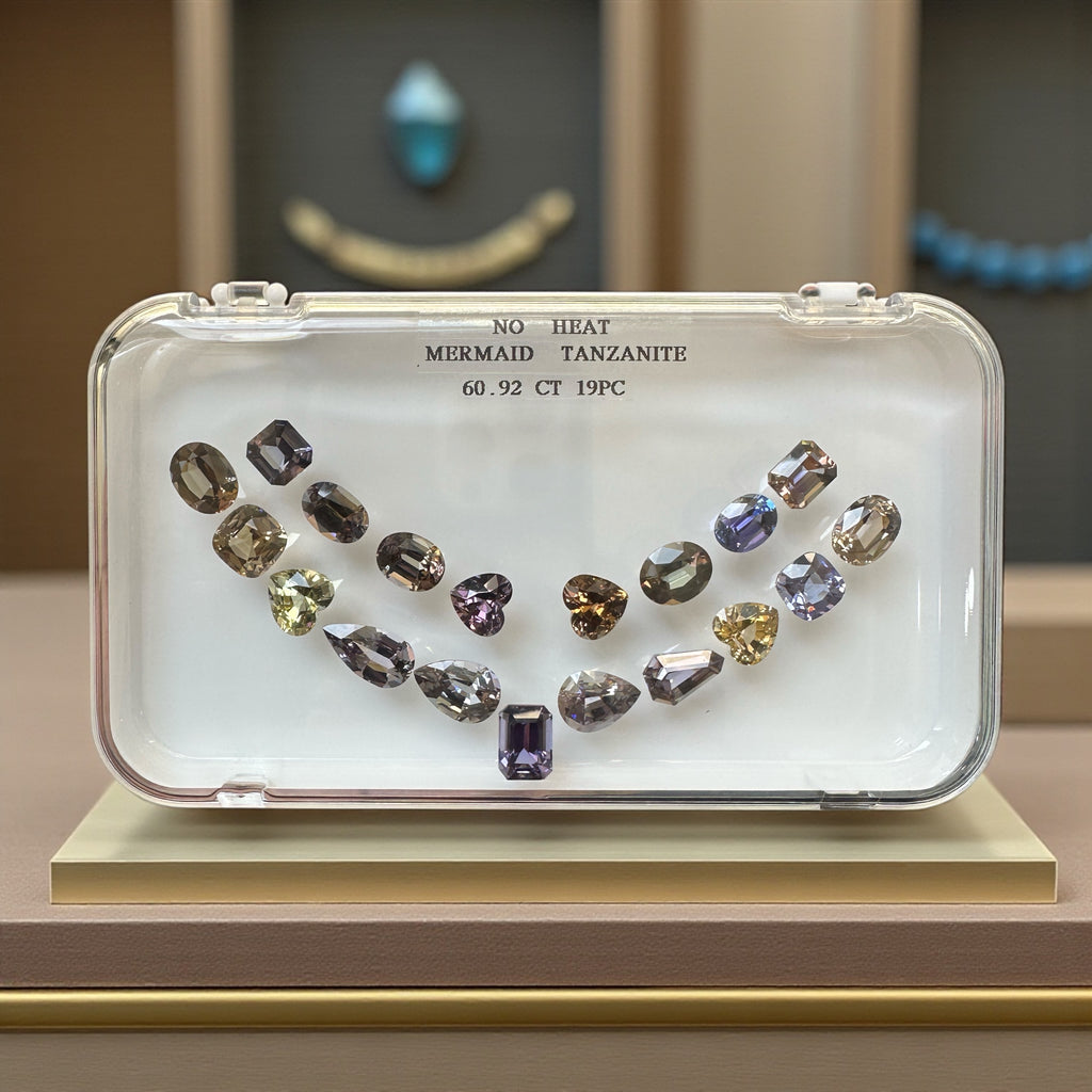 60.92 CT NATURAL NO HEAT MERMAID TANZANITE SET