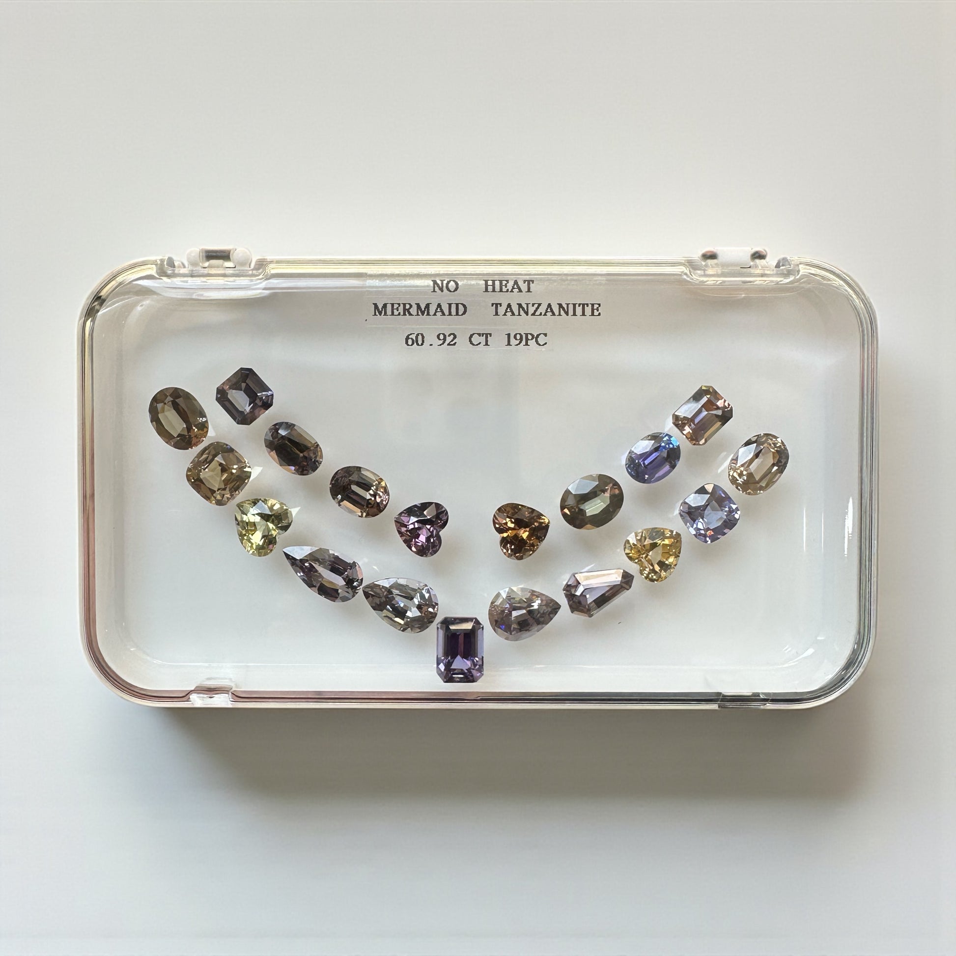 60.92 CT NATURAL NO HEAT MERMAID TANZANITE SET